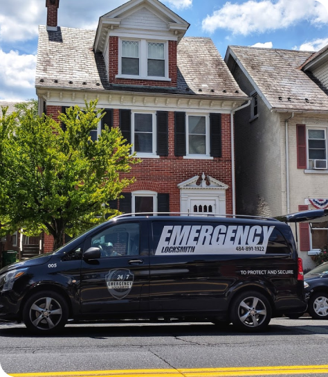 Lehigh Valley Locksmith Van parked in front of a brick house