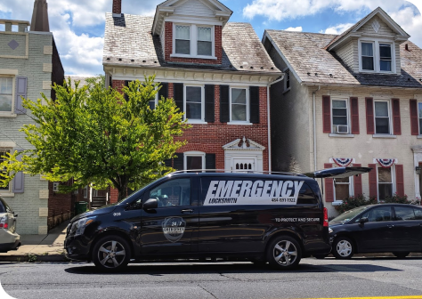 Emergency Locksmith Van Outside Residential Home