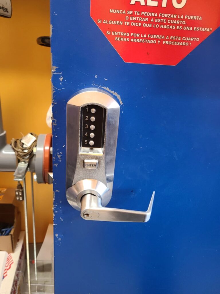 A door with commercial numerical keypad lock