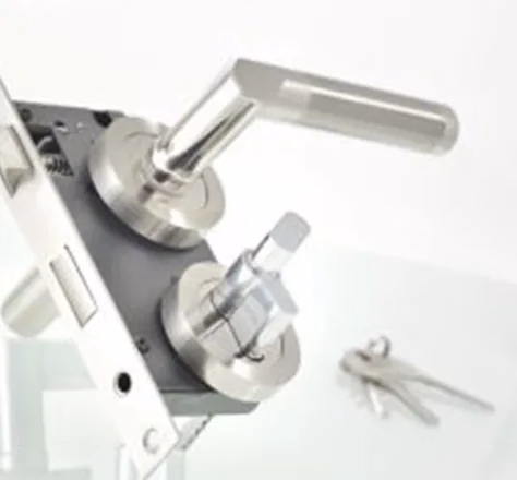 a door locking mechanism on a table
commercial lock install