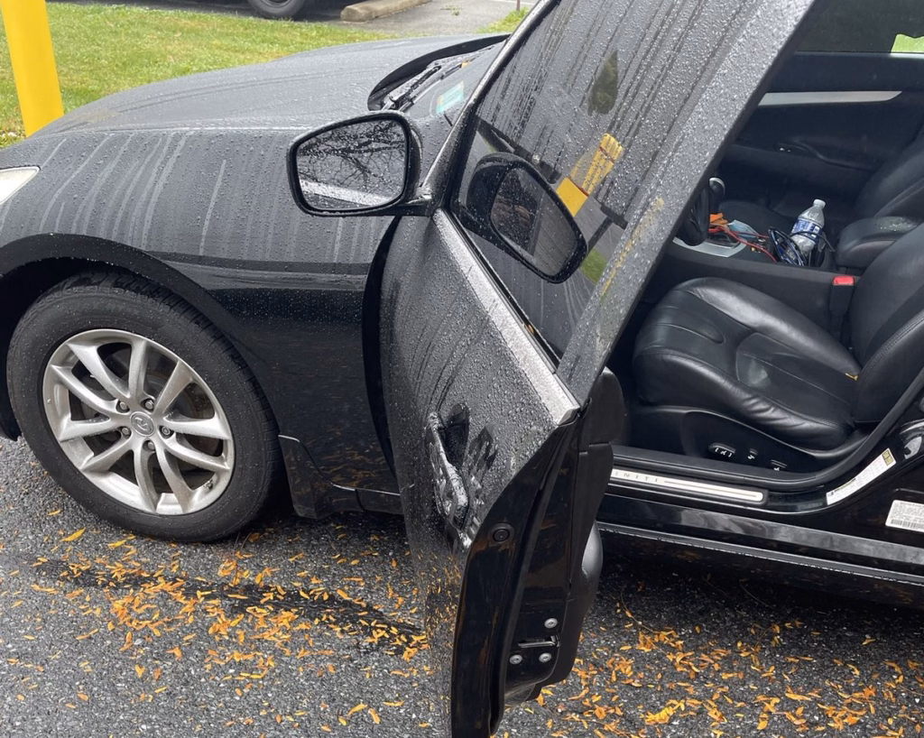Car lockout in Wind Gap, PA: driver's door of a black Infiniti opened by 24/7 Emergency Locksmith
