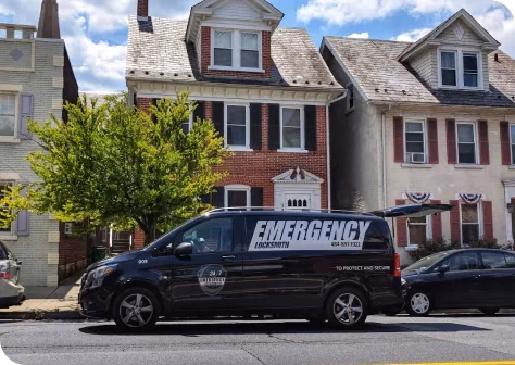 Emergency Locksmith Van Outside Residential Home