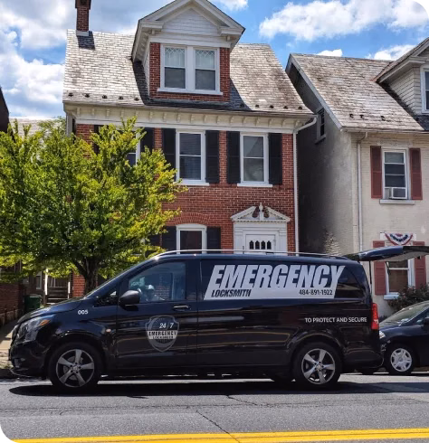 Emergency locksmith van on residential street